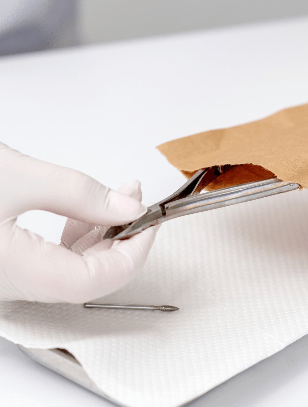 272aa552 hands are taking manicure tools from craft envelope before manicure procedure 1 min.jpg